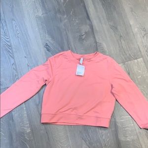 pink long sleeve crew neck cropped from h&m